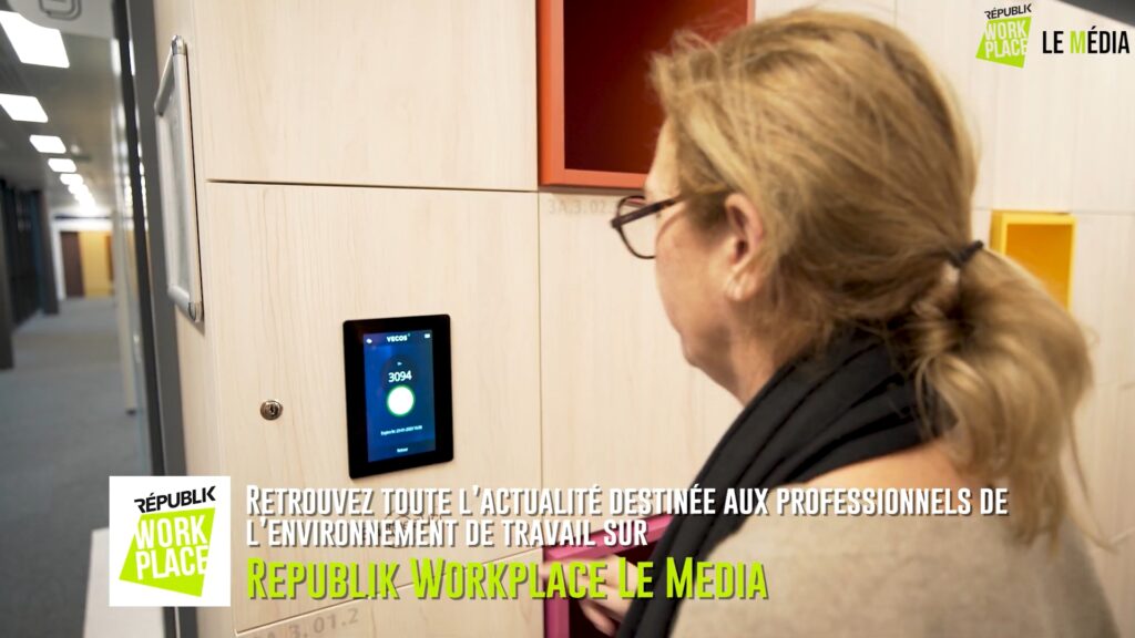 Office employees accessing smart lockers