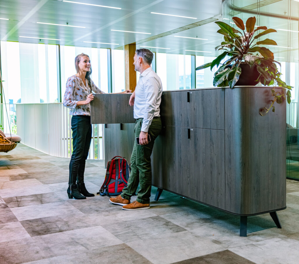 Employee retrieving items from smart locker